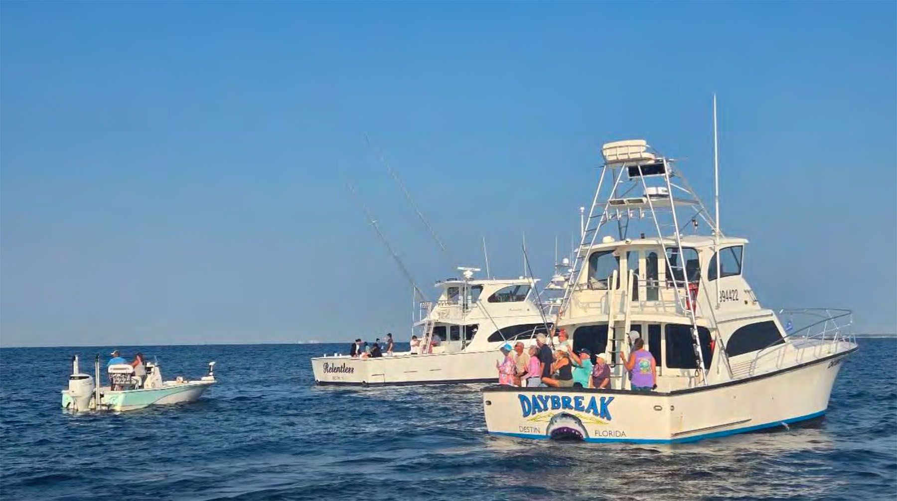 Destin High School students and community donors on-site for deployment of reefs.
