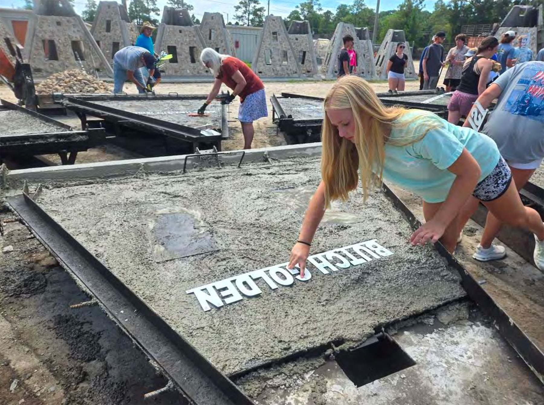 Destin High School students getting a hands-on experience building artificial reefs.